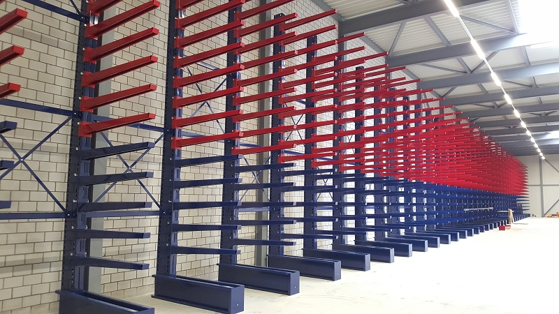 Sipag one-sided cantilever rack with different colour arms for different loading capacities.