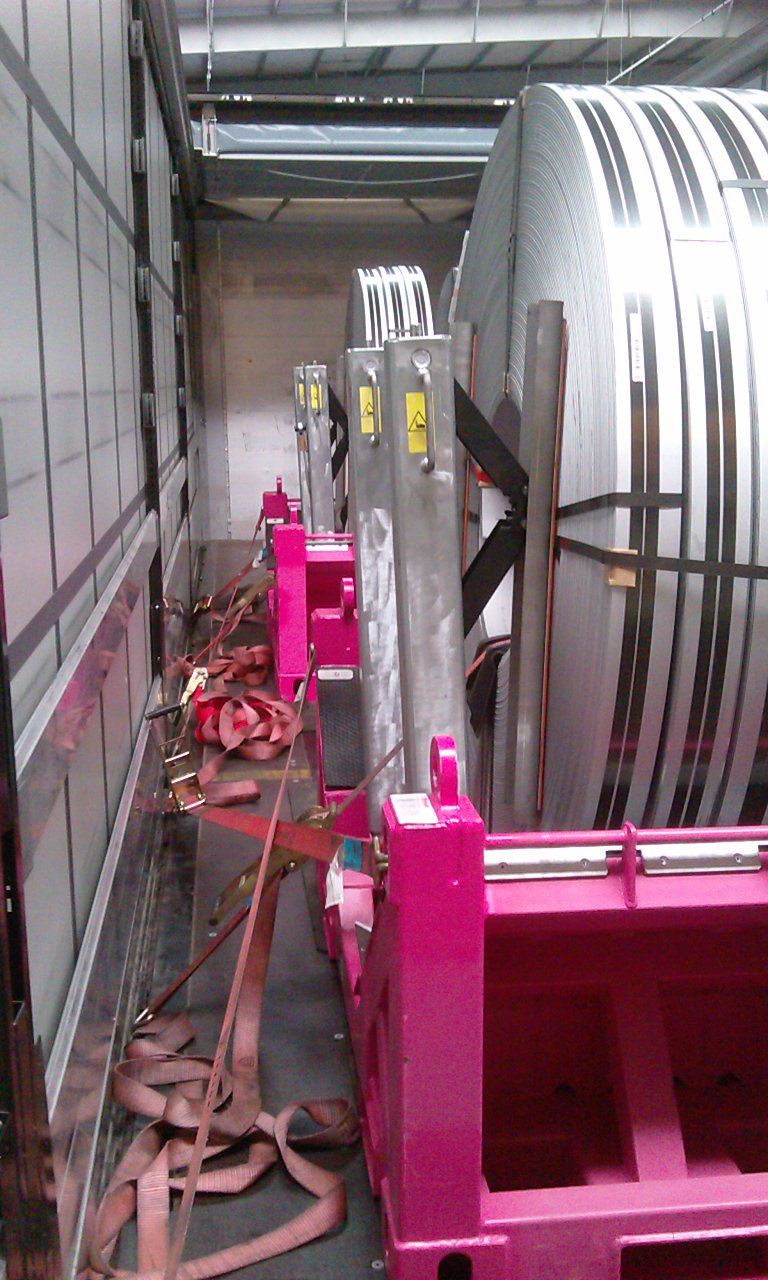 UTLS Systems coil transportation rack with UTLS stanchions Vario. For safe transportation of slit coils on trucks and trailers.