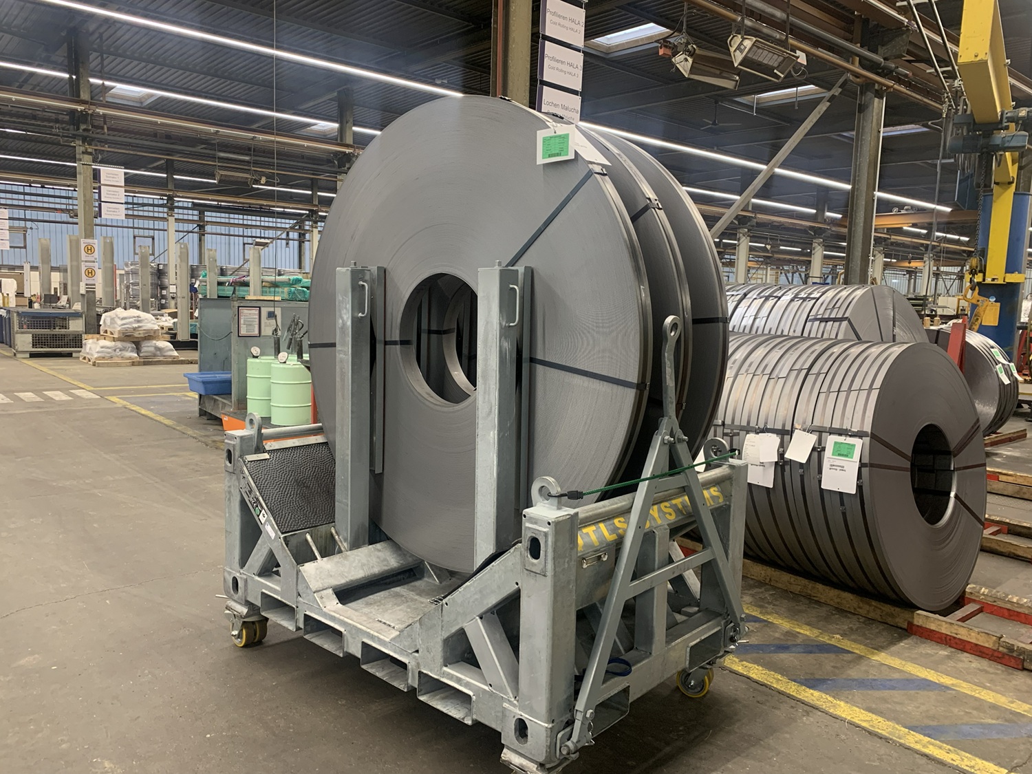 UTLS Systems coil transportation rack with UTLS stanchions Vario and trolley FR5. The trolley is easily monuted to the rack with the help of Twistlock in the rack's ISO container corner system.